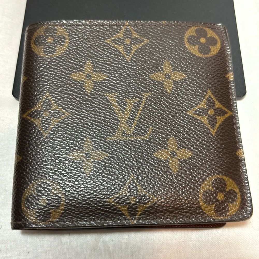Louis Vuitton Monogrammed bi-fold wallet